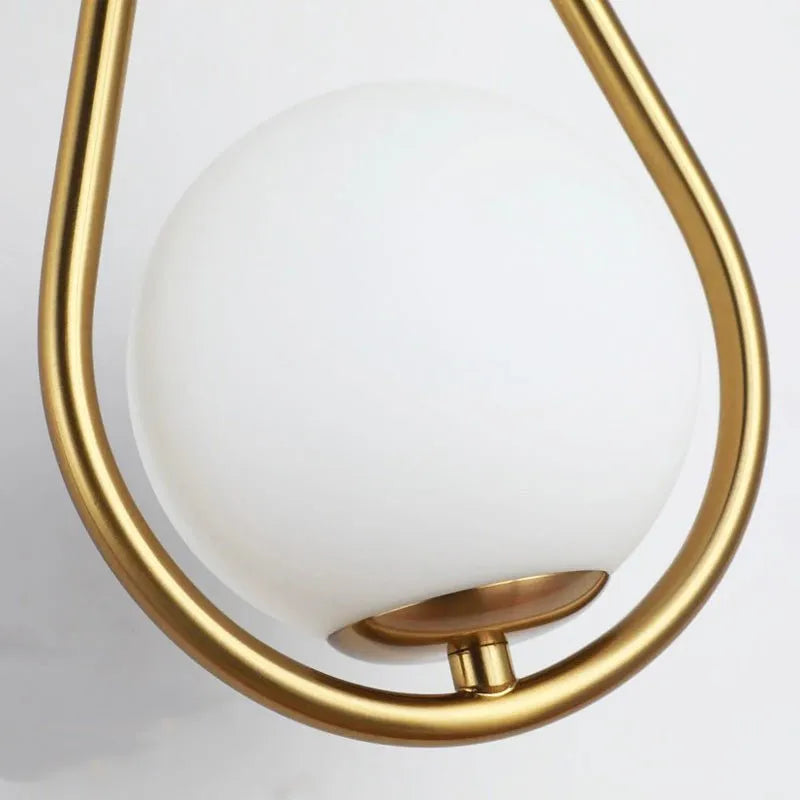 Wandleuchte Kugel Goldmetall